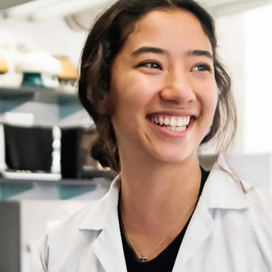 Medical student smiling in lab