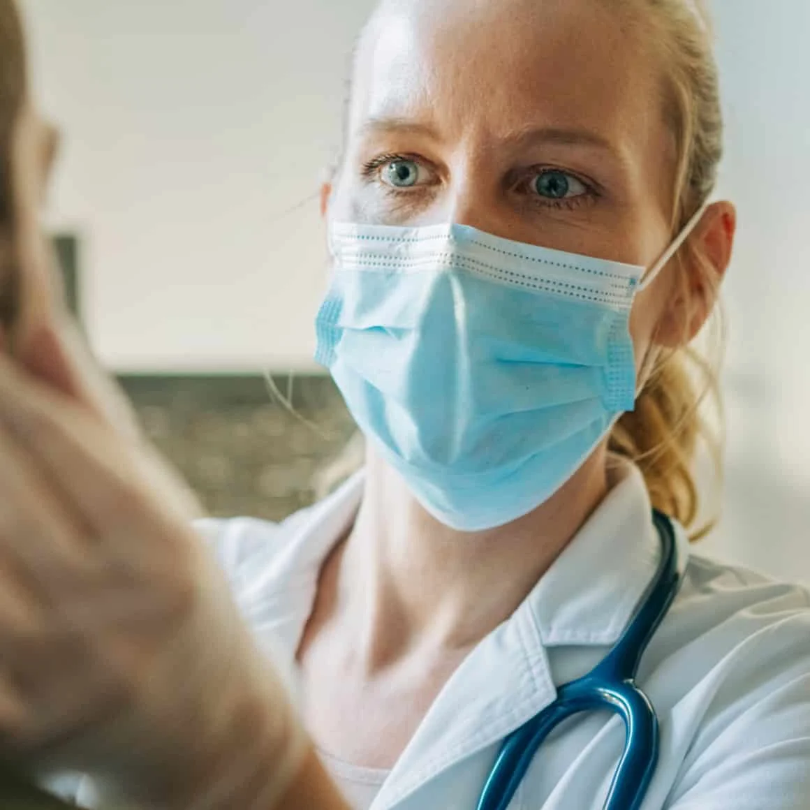 Physician Checking Patient Header